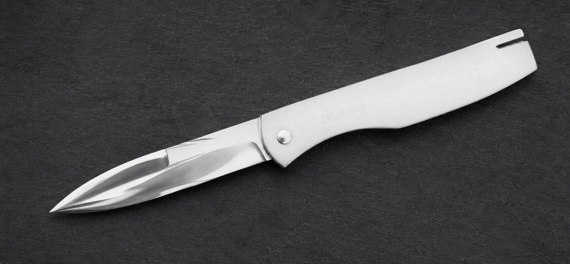 Handmade folding knives by Lloyd Harding