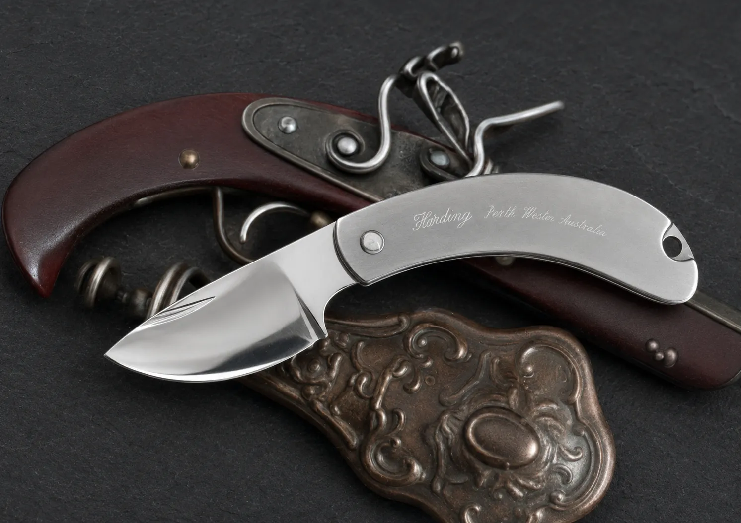 Handmade folding knives by Lloyd Harding