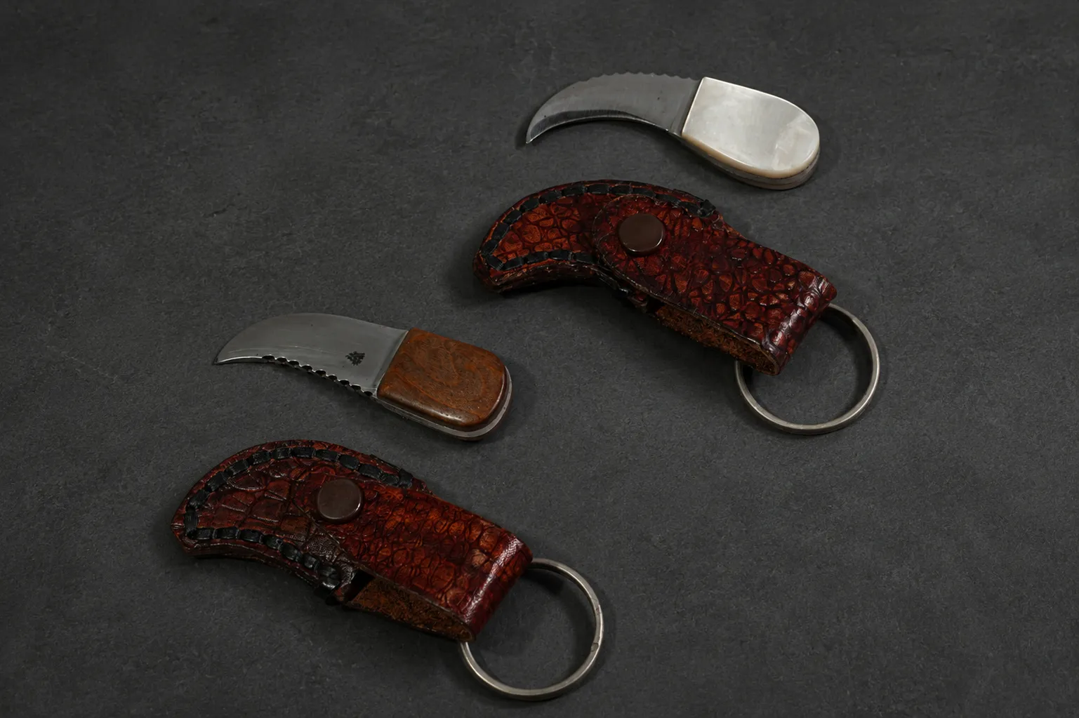 Handmade miniature knives by Lloyd Harding