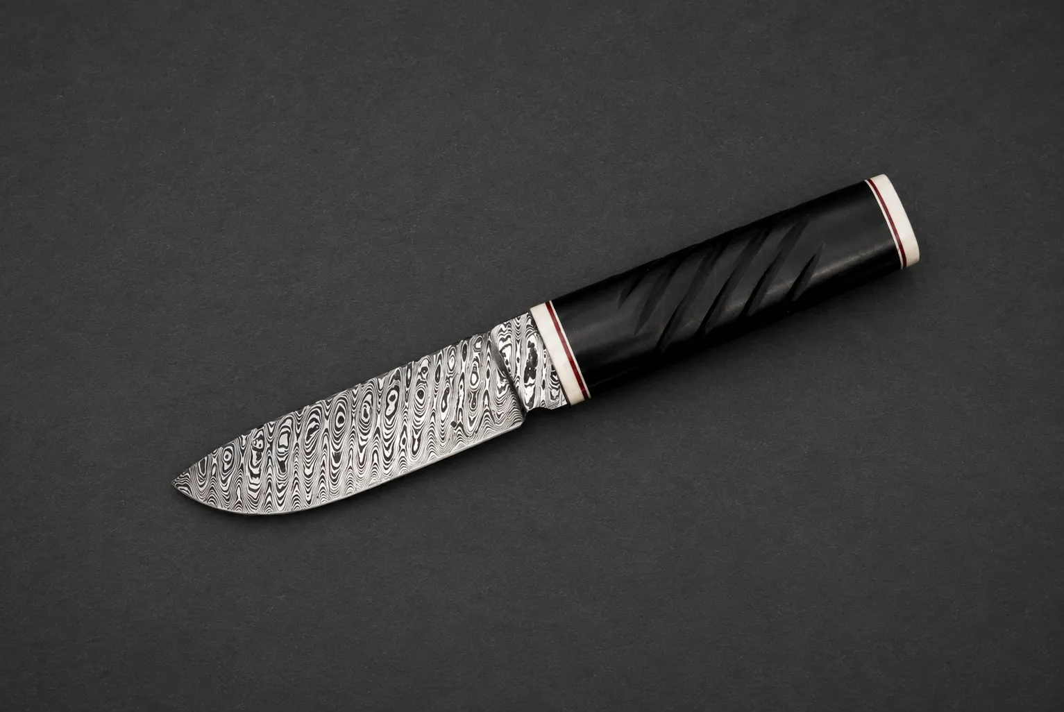 Handmade skinning knives by Lloyd Harding