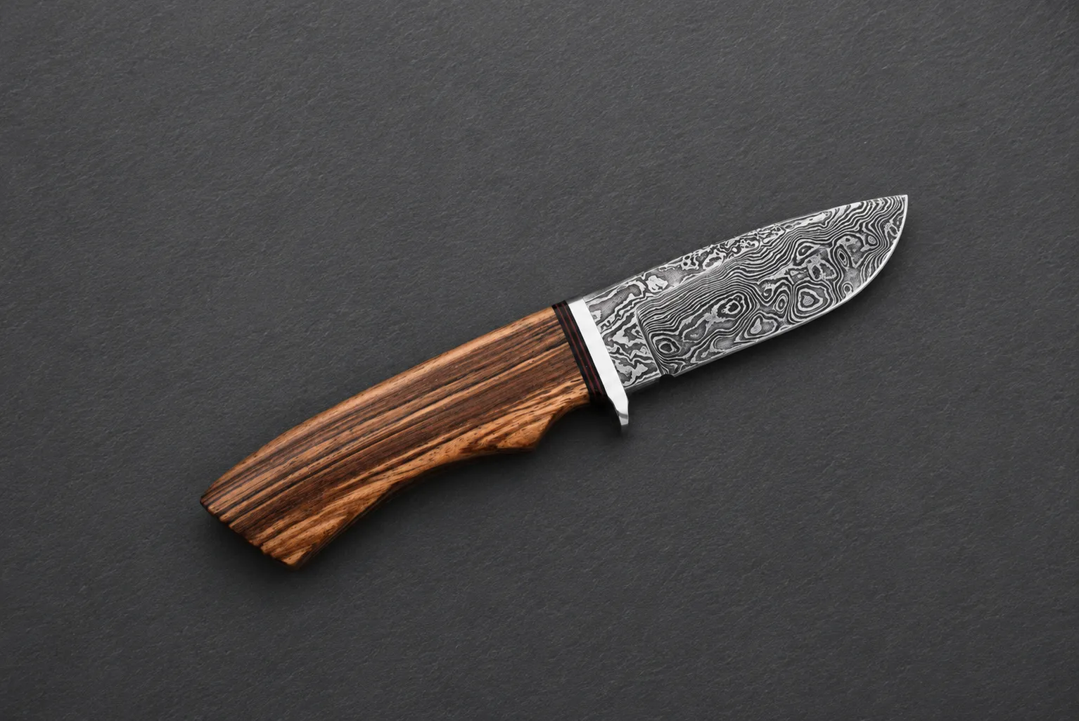 Handmade skinning knives by Lloyd Harding